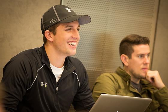 Photo of two male Chatham University students listening to a lecture